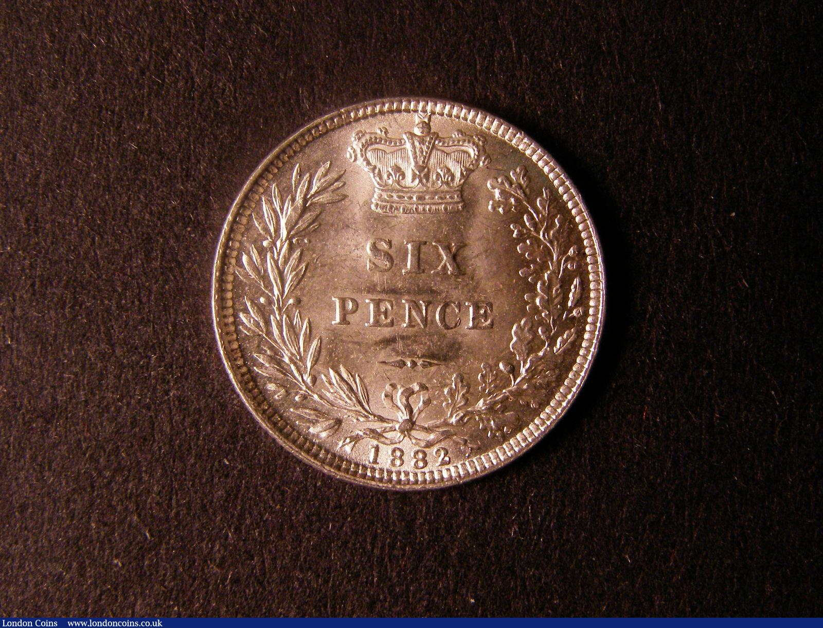 London Coins : A124 : Lot 940 : Sixpence 1882 ESC 1743 UNC with a few light hairlines on the obverse