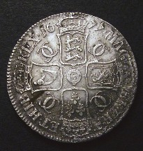London Coins : A126 : Lot 887 : Crown 1677 7 over 6 ESC 53 VF/NVF with uneven toning and some adjustment marks on the obverse, l...