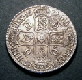 London Coins : A130 : Lot 1028 : Crown 1677 with boar's head flaw on obverse ESC 54 VF/GVF with some haymarks on the obverse