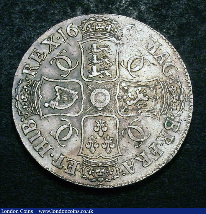 London Coins : A133 : Lot 231 : Crown 1668 ANNO . REGNI. on edge ESC 36 NVF/VF with some haymarks and contact marks, the obverse...