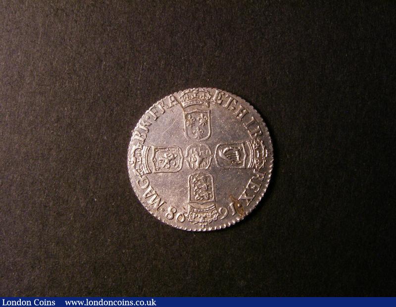 London Coins : A135 : Lot 2009 : Sixpence 1698 Plain ESC 1574 EF with two areas of haymarking on the reverse, compares favourably...