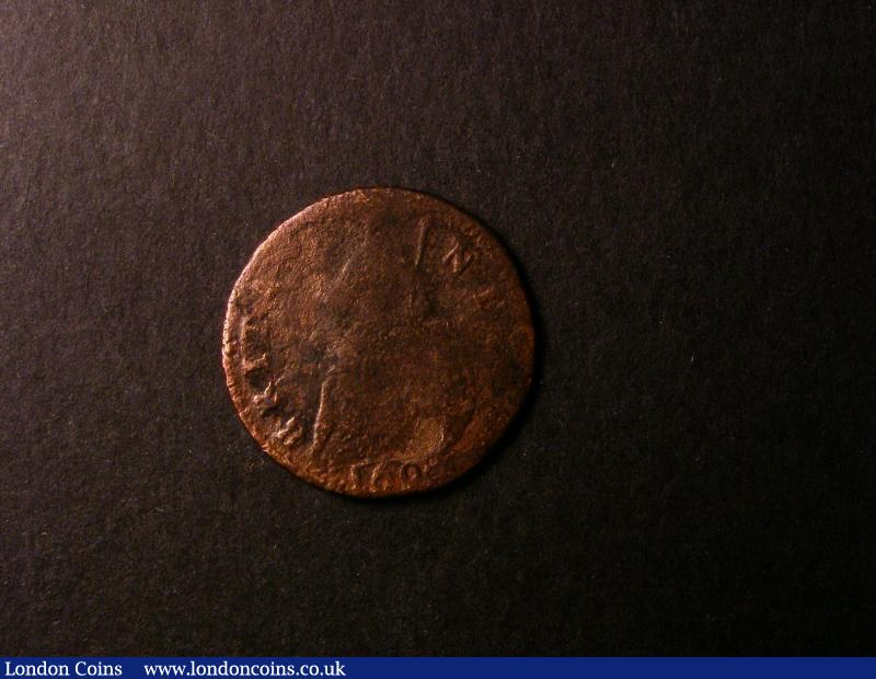 London Coins : A137 : Lot 1429 : Farthing 1698 date in Exergue with B over G in BRITANNIA Peck 664 only Poor with pitted surfaces but...