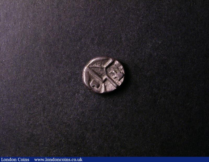 London Coins : A138 : Lot 1634 : Celtic Silver Quarter Stater Durotriges Geometric type. Obverse Crescent design Reverse zig-zag patt...