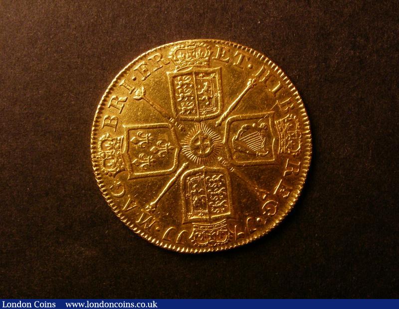 London Coins : A138 : Lot 2841 : Two Guineas 1711 S.3569 VF a depression above the Queen's head is a slight distraction, viewing ...