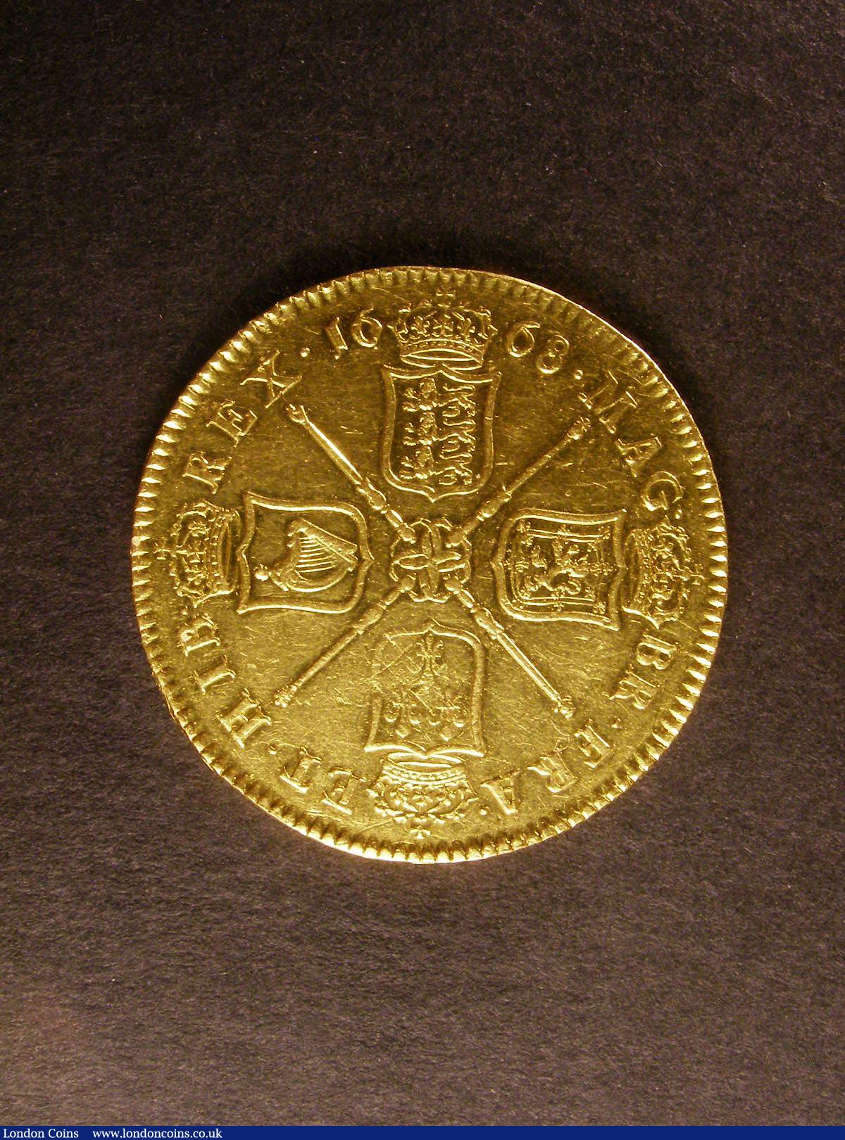 London Coins : A139 : Lot 1754 : Five Guineas 1668 first bust with elephant below S3329 EF as far as discernible detail is concerned ...
