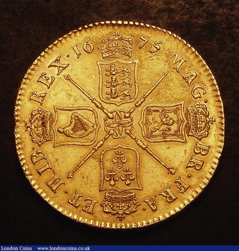 London Coins : A139 : Lot 1756 : Five Guineas 1675 S.3328A EF or near so a superb portrait with some surface marks and flan flaws. A ...