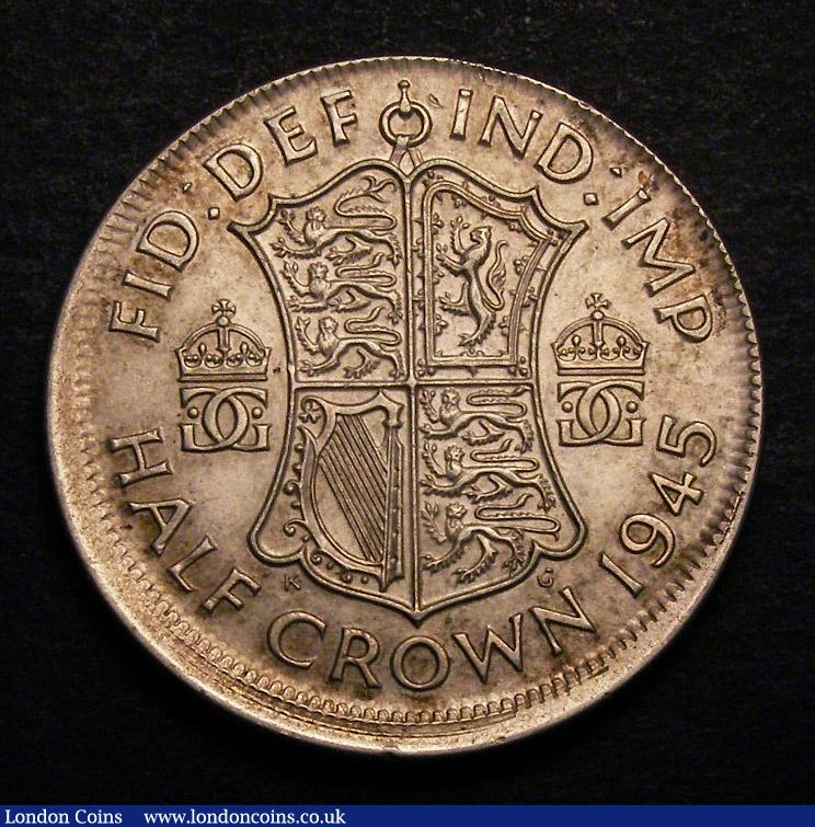 London Coins : A140 : Lot 1275 : Mint Error Mis-Strike Halfcrown 1945 struck off-centre without a collar, largely plain edge with...