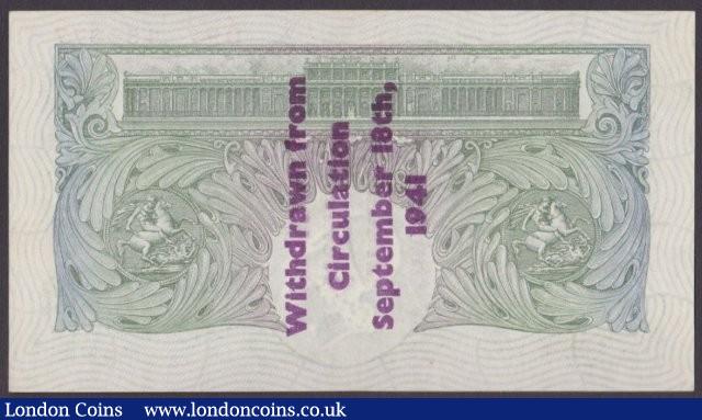 London Coins : A140 : Lot 147 : One Pound Mahon B212A Guernsey overprint series D94 154877, this is EF to UNC condition, and...