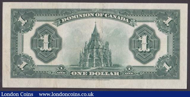 London Coins : A140 : Lot 464 : Canada, The Dominion of Canada $1 dated 1923 series J-630742, blue seal at right, McCavour-Saunders,...
