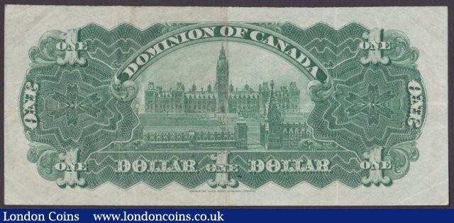 London Coins : A140 : Lot 470 : Canada, The Dominion of Canada $1 dated March 31st 1898 series J418336 signed Courtney, ...