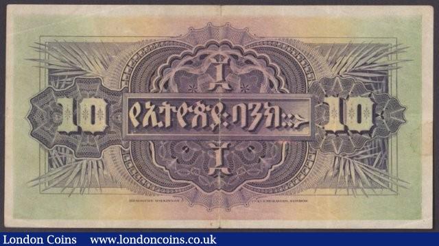 London Coins : A140 : Lot 508 : Ethiopia 10 thalers dated 31st May 1935 series B/3 20061, leopard at centre, Pick8, tiny...