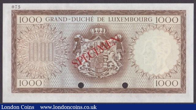 London Coins : A140 : Lot 588 : Luxembourg 1000 francs issued 1960-63 series A000000, Specimen No.075, SPECIMEN ovpt. & 2 punch-...