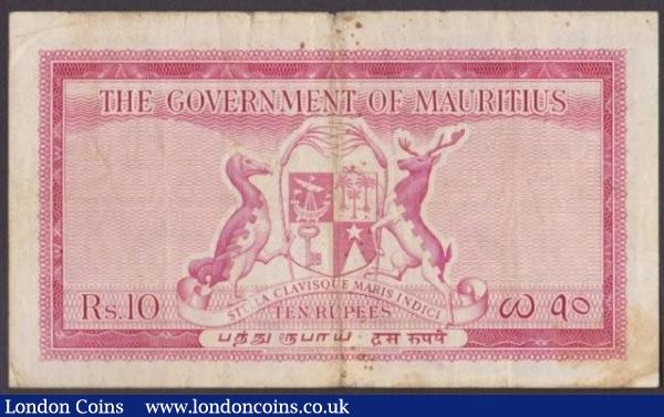 Mauritius 10 rupees issued 1954, QE2 portrait at right, series F400070, Pick28, edge nicks and small stains, good Fine : World Banknotes : Auction 140 : Lot 609