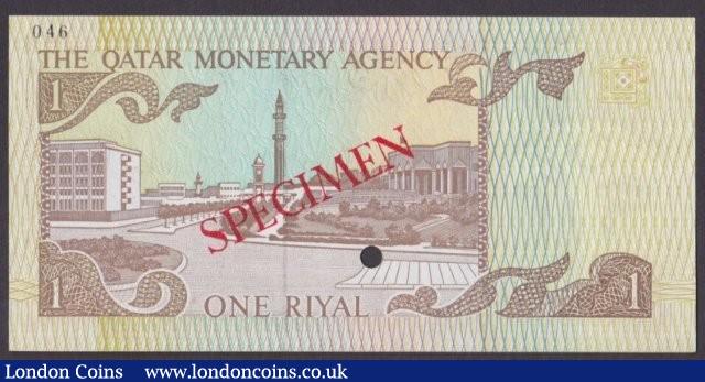 London Coins : A140 : Lot 642 : Qatar Monetary Agency 1 riyal issued 1980s, Specimen No.046, SPECIMEN ovpt. & 1 punch-ho...