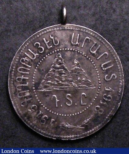 London Coins : A142 : Lot 1217 : South East Asia Silver Medal 1915-1918 VF toned with a loop mount at the top, interesting and in...