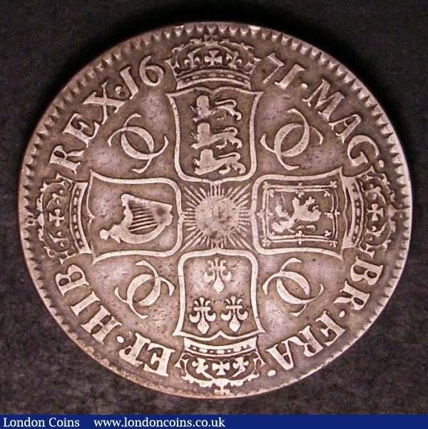 Crown 1671 Second Bust E of ET struck over R ESC 42A rated R4 by ESC, Fine or near so the error legend clear : English Coins : Auction 142 : Lot 1963