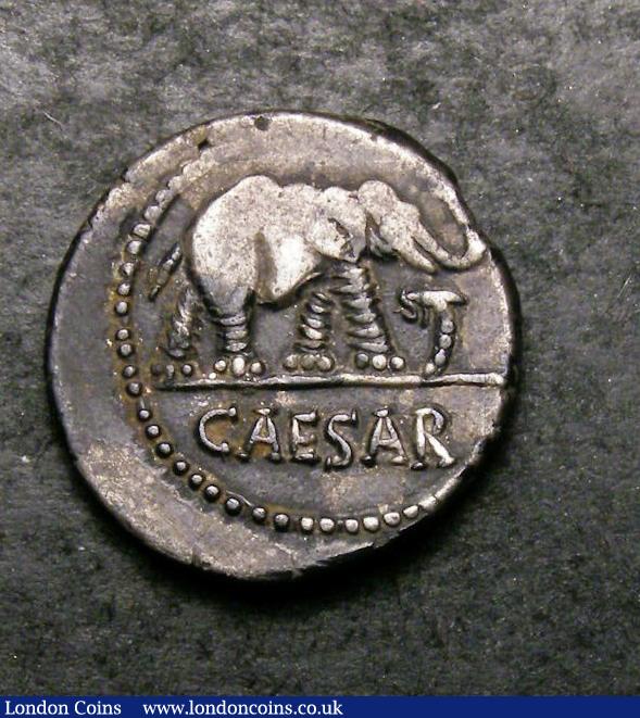 London Coins : A143 : Lot 1402 : Denarius Ar. Julius Caesar. C, 49-48 BC. Obv; Elephant advancing right, serpent before, CAESAR below...