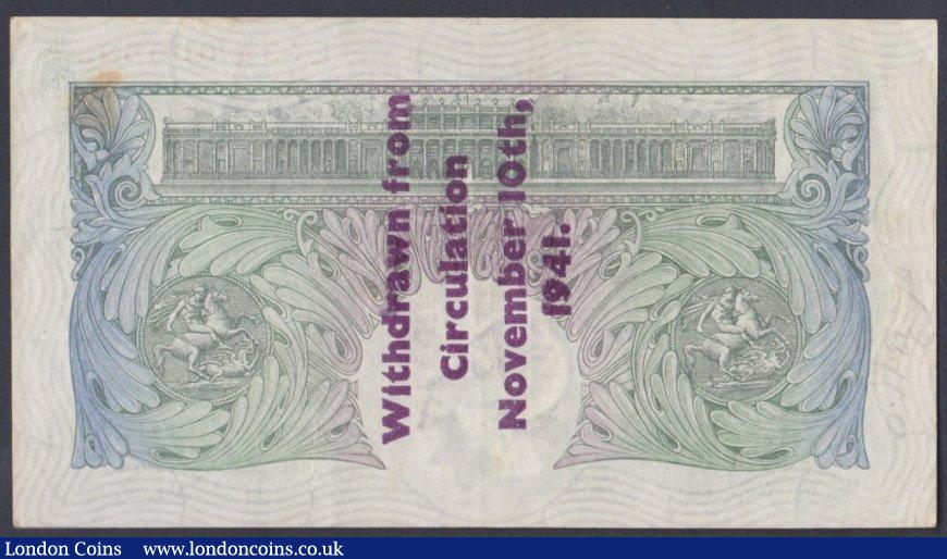 London Coins : A144 : Lot 120 : One pound Peppiatt B239A Guernsey overprint series E03A 006585, "Withdrawn from circulation Nov...