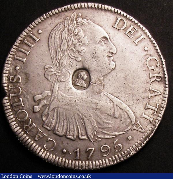 Dollar George III Oval Countermark on 1785 Bolivia 8 Reales ESC 131 countermark NEF host coin NVF with an edge nick by the US of CAROLUS : English Coins : Auction 145 : Lot 1444