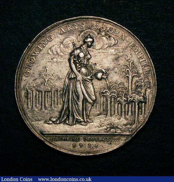 Jernegan's Lottery 1736 39mm diameter in Silver by J.S.Tanner Eimer 537 Obverse: Minerva standing between military trophies and emblems of the Arts and Sciences. BOTH HANDS FILL'D FOR BRITAIN. Exergue: GEORGE REIGNING. Reverse Caroline royally robed, waters a grove of young palm trees. GROWING ARTS ADORN EMPIRE.. Exergue CAROLINE PROTECTING 1736 GVF and scarce thus Note: originally given to purchasers of a Lottery Ticket for a silver cistern made by Henry Jernegan (d.1761) a London goldsmith and banker : Medals : Auction 146 : Lot 1876