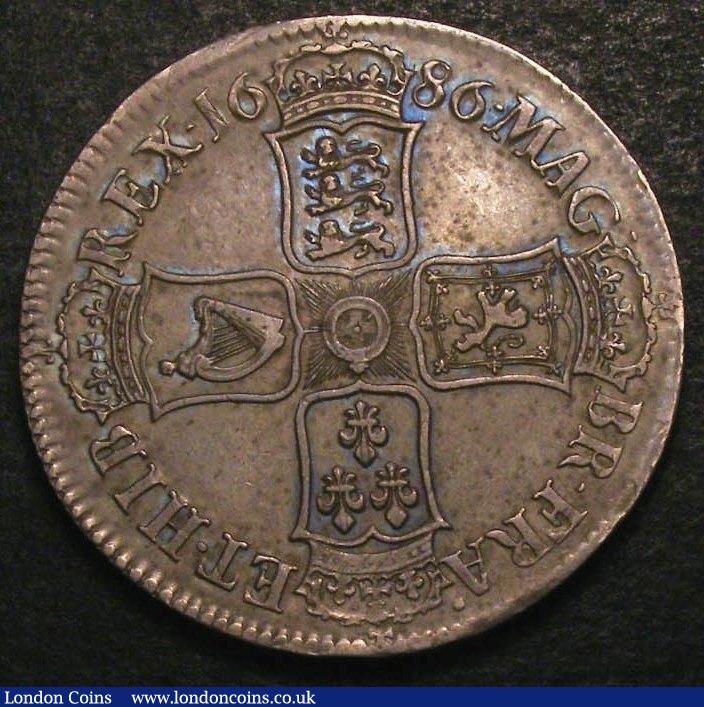 London Coins : A147 : Lot 1955 : Crown 1686 No Stops on Obverse ESC 77 VF with an attractive grey tone with hints of blue, slabbed an...