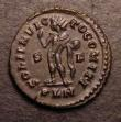 London Coins : A147 : Lot 1778 : Follis Ae.  Constantine I.  C, 313-314 AD.  Rev; SOLI INVICTO COMITI; Sol stg l arm extended holding...
