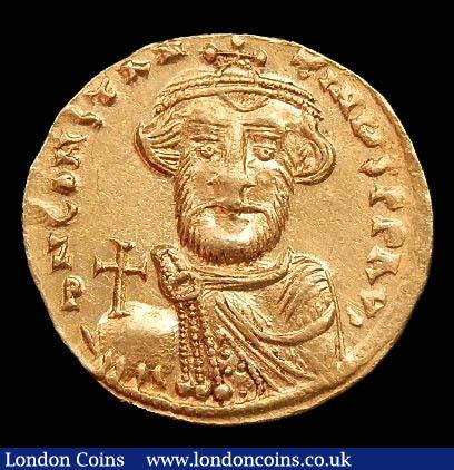 Solidus Au. Constans II.  C, 648-649 AD.  Constantinople mint.  Obv;  ∂ N CONSτAN–τINЧS P P AV·, crowned bust facing, bearded and wearing chlamys, holding globus cruciger in right hand.  Rev; VICTORIA AVςЧ, cross potent set on three steps; Z to right; CONOB in ex.  SB 949. 4.46g.  NEF. : Ancient Coins : Auction 148 : Lot 1425