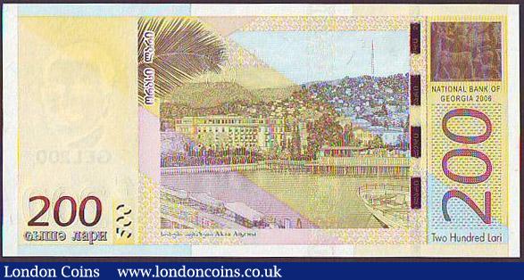 London Coins : A148 : Lot 239 : Georgia 200 lari dated 2006 series H03428786, Kakutska Choloashvili portrait at left, Pick75, UNC