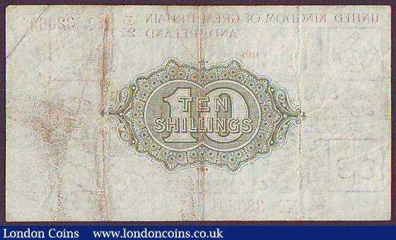 London Coins : A148 : Lot 41 : Ten shillings Warren Fisher T26 issued 1919, 1st series No. with dash D/21 320691, tiny pinhole &...