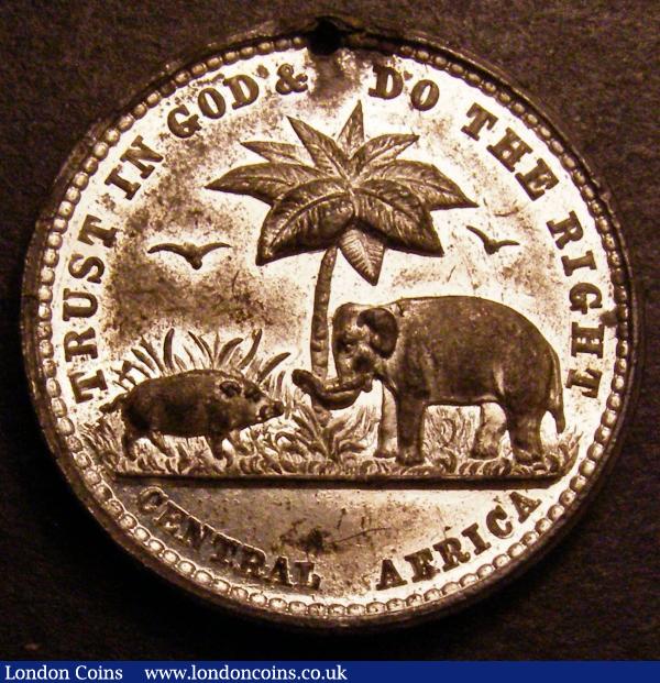 Advertising Token 19th Century Charles Aston Birmingham Obverse Head facing left  MERCHANT AND MANUFACTURER. ENGL & St. PAUL DE LOANDA Reverse Elephant, Pig and Birds in flight below tree TRUST IN GOD & DO THE RIGHT Exergue CENTRAL AFRICA in white metal, VF holed : Tokens : Auction 148 : Lot 943