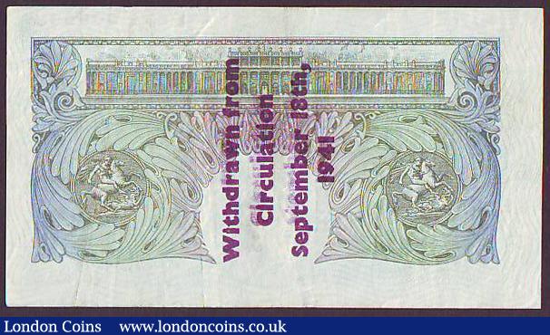 London Coins : A149 : Lot 106 : One pound Peppiatt B239A Guernsey overprint series E03A 009983, Withdrawn from circulation September...