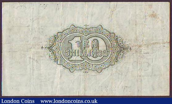 London Coins : A149 : Lot 70 : Ten shillings Bradbury T17 issued 1918 black serial A/15 253623 No.with dot, stains, Fine
