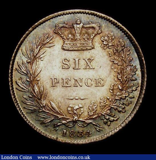 London Coins : A151 : Lot 1691 : Sixpence 1834 ESC 1674 CGS type SP.W4.1834.01, Choice UNC with blue and green tone, slabbed and grad...