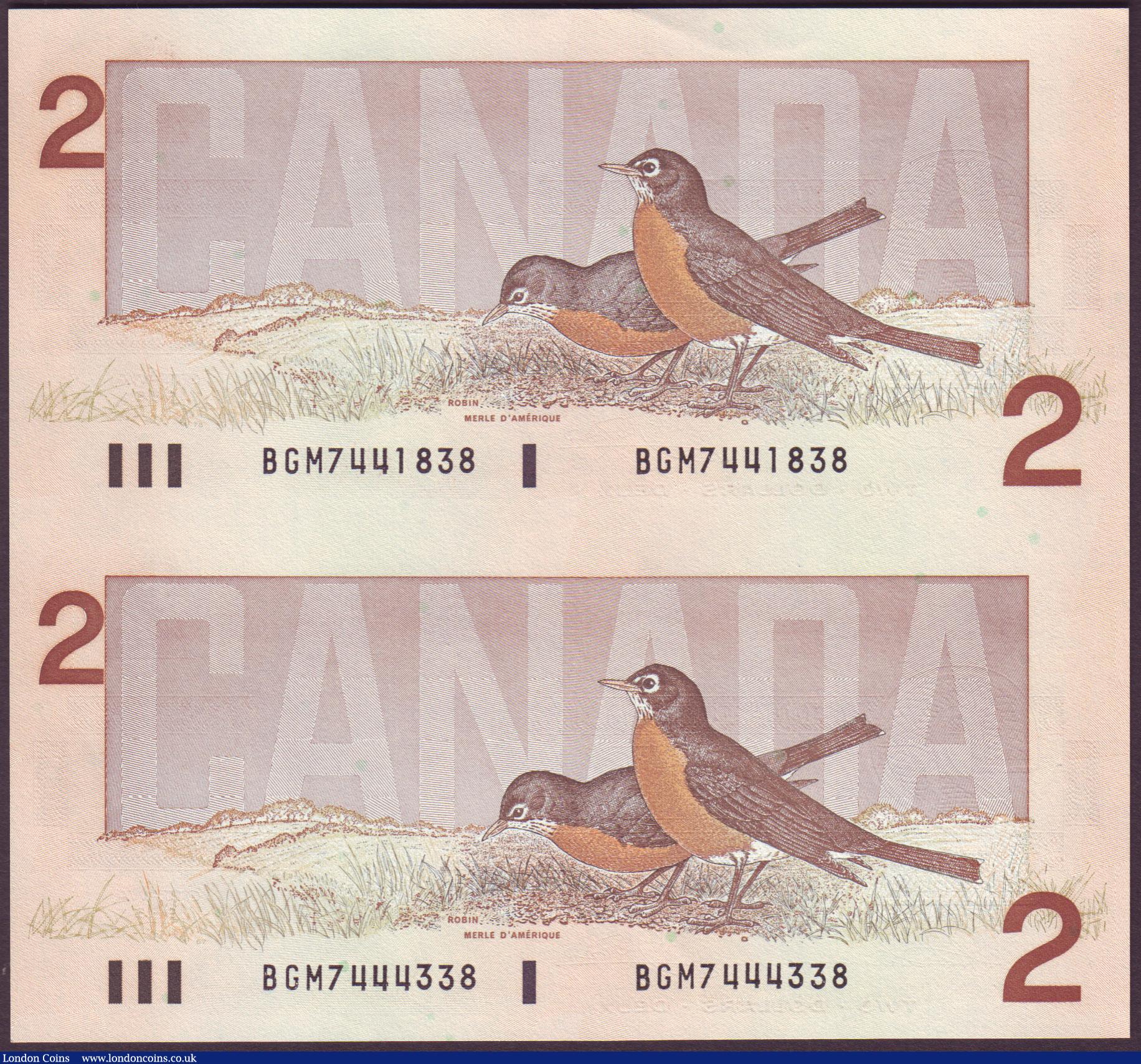 London Coins : A151 : Lot 204 : Canada $2 uncut pair dated 1986, upper note series BGM7441838 & lower note BGM7444338, (this com...