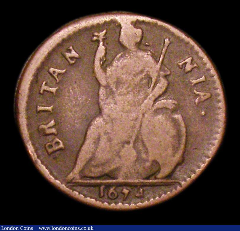 London Coins : A151 : Lot 2311 : Farthing 1674 C over reverse C in CAROLVS and thus appearing OAROLVS, as Cooke collection no.725, un...