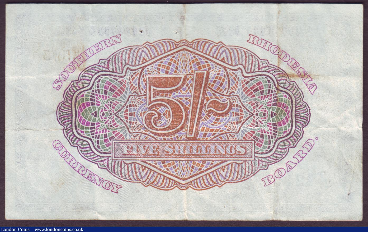 London Coins : A151 : Lot 553 : Southern Rhodesia 5 shillings dated 1st October 1945 series D/37 024595, KGVI portrait, Pick8b, larg...
