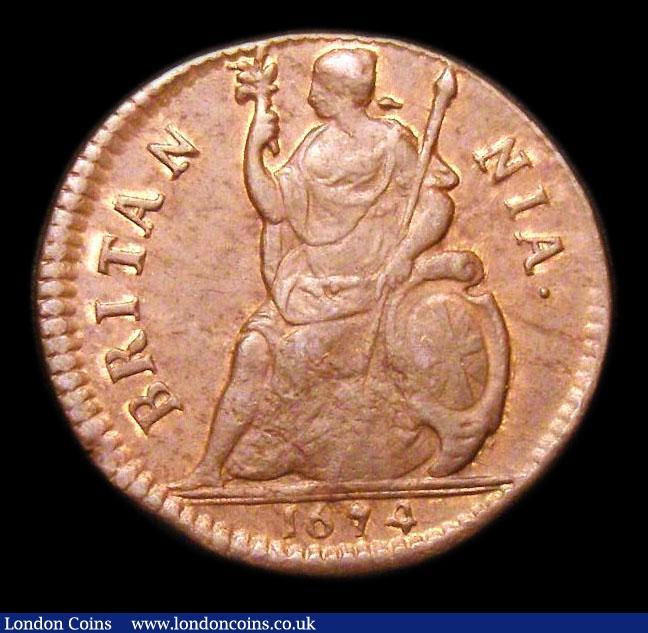 London Coins : A152 : Lot 2071 : Farthing 1674 Peck 527 EF with traces of lustre, a slightly weaker strike, slabbed and graded CGS 60...
