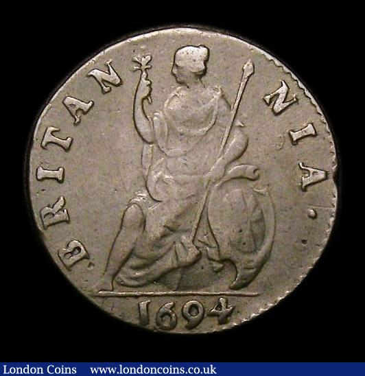 London Coins : A152 : Lot 2078 : Farthing 1694 Single Exergue line, Peck 619 Good Fine, slabbed and graded CGS 35, the only example t...