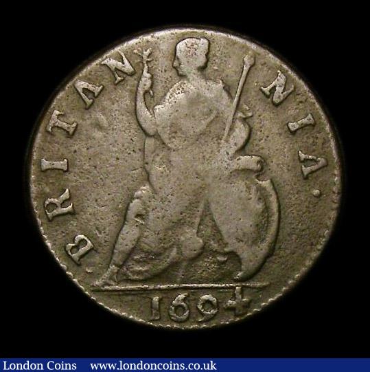 London Coins : A152 : Lot 2079 : Farthing 1694 Unbarred A's in BRITANNIA, No stop after MARIA, Peck 618* Near Fine on a pitted f...