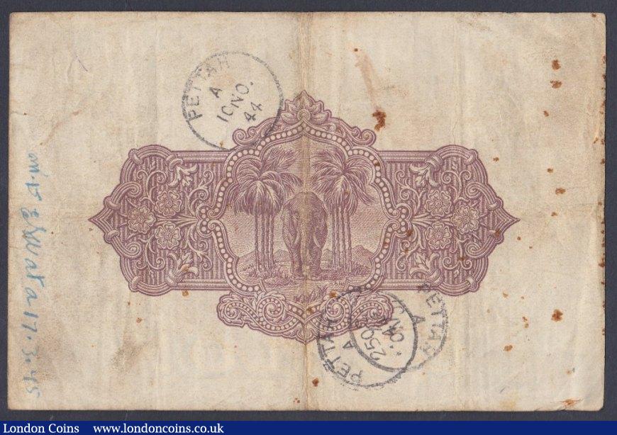 London Coins : A152 : Lot 225 : Ceylon 10 rupees dated 2nd October 1939 series D/60 42064, Pick25c, inked annotations & bank sta...