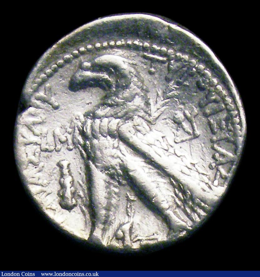 London Coins : A153 : Lot 1791 : Ancient Phoenicia Tyre Half Shekel 73-68BC Reverse Eagle facing left, LM in left field, Good Fine