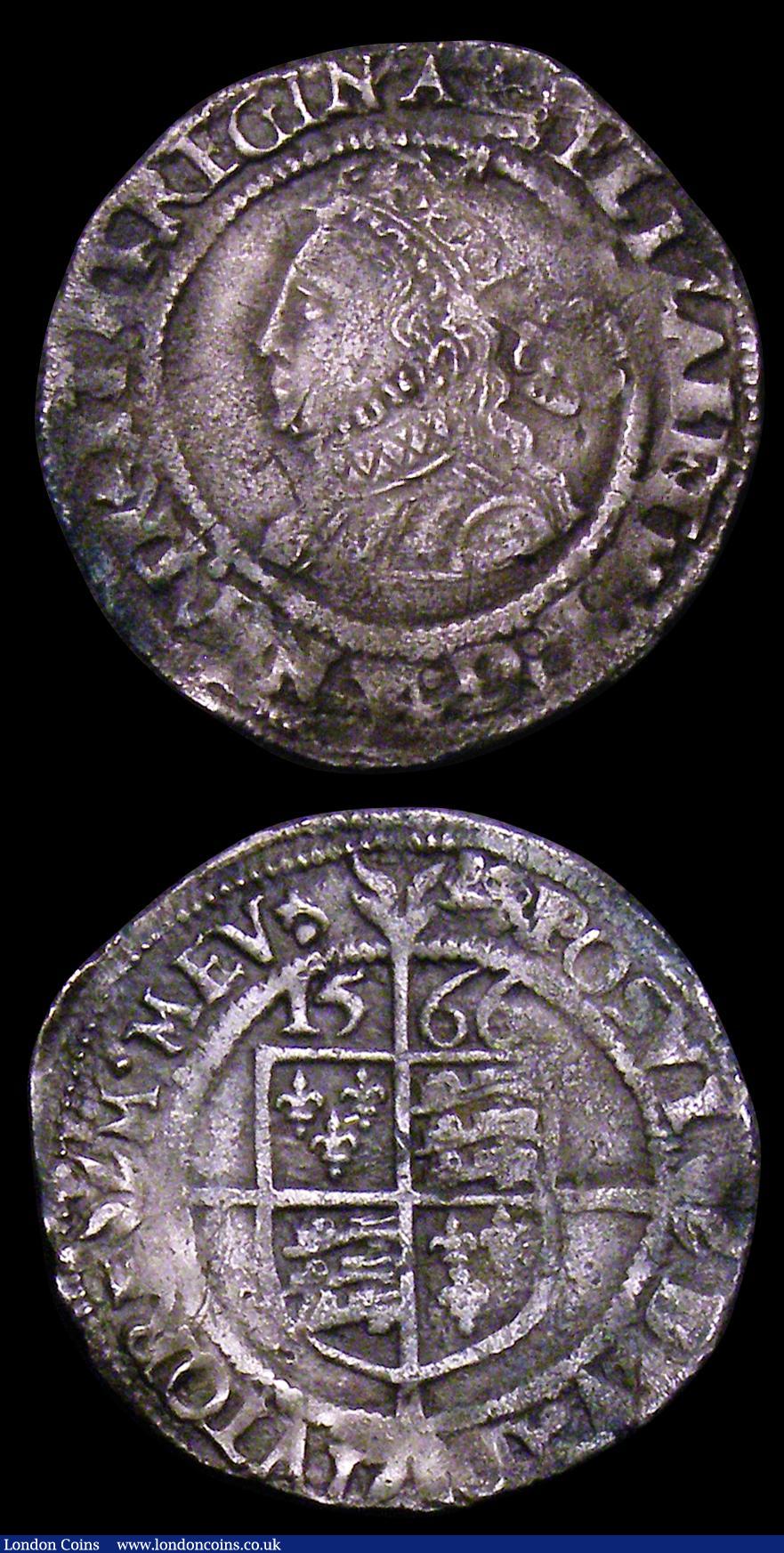 London Coins : A153 : Lot 2030 : Threepences Elizabeth I (2) 1566 Third Issue S.2565 mintmark Lion, this possibly overstruck, Good Fi...