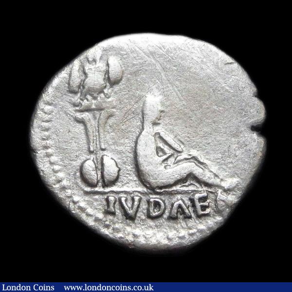 London Coins : A153 : Lot 2085 : Ar denarius.  Vespasian.  C, 69-70 AD  Rome.  Rev;   IVDAEA in exergue, trophy; to right, Judaea sea...