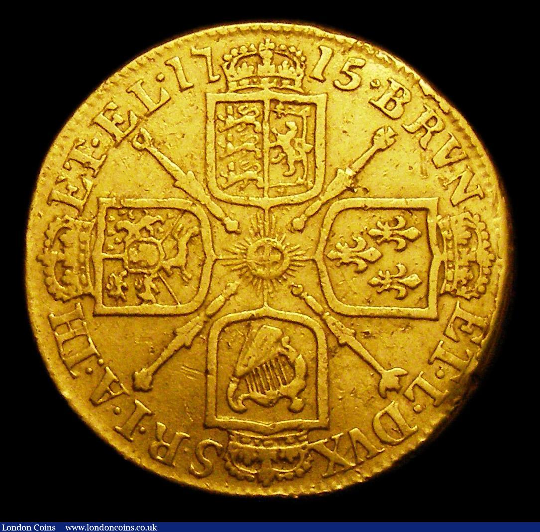 London Coins : A153 : Lot 2207 : Guinea 1715 Third Laureate Head S.3630 About Fine with some scratches and light smoothing in the obv...