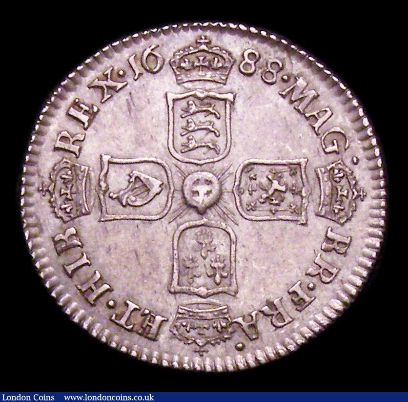London Coins : A153 : Lot 2298 : Sixpence 1688 Later shields altered from early shields ESC 1528 Nearer EF than VF, the obverse with ...