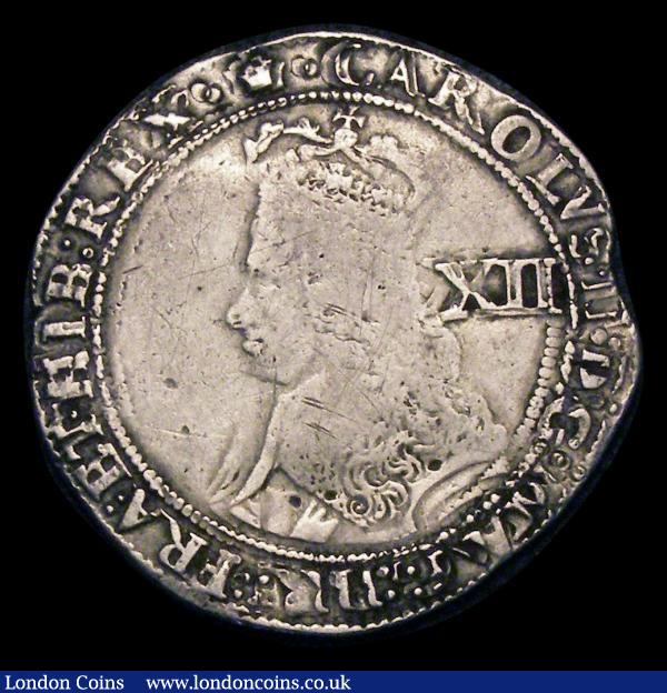Shilling Charles II Hammered issue type C with inner circles and mark of value, mintmark Crown, ESC 1019  Near Fine/Fine with some double striking to the obverse legend, the edge short of flan at 3 o'clock : Hammered Coins : Auction 154 : Lot 1679