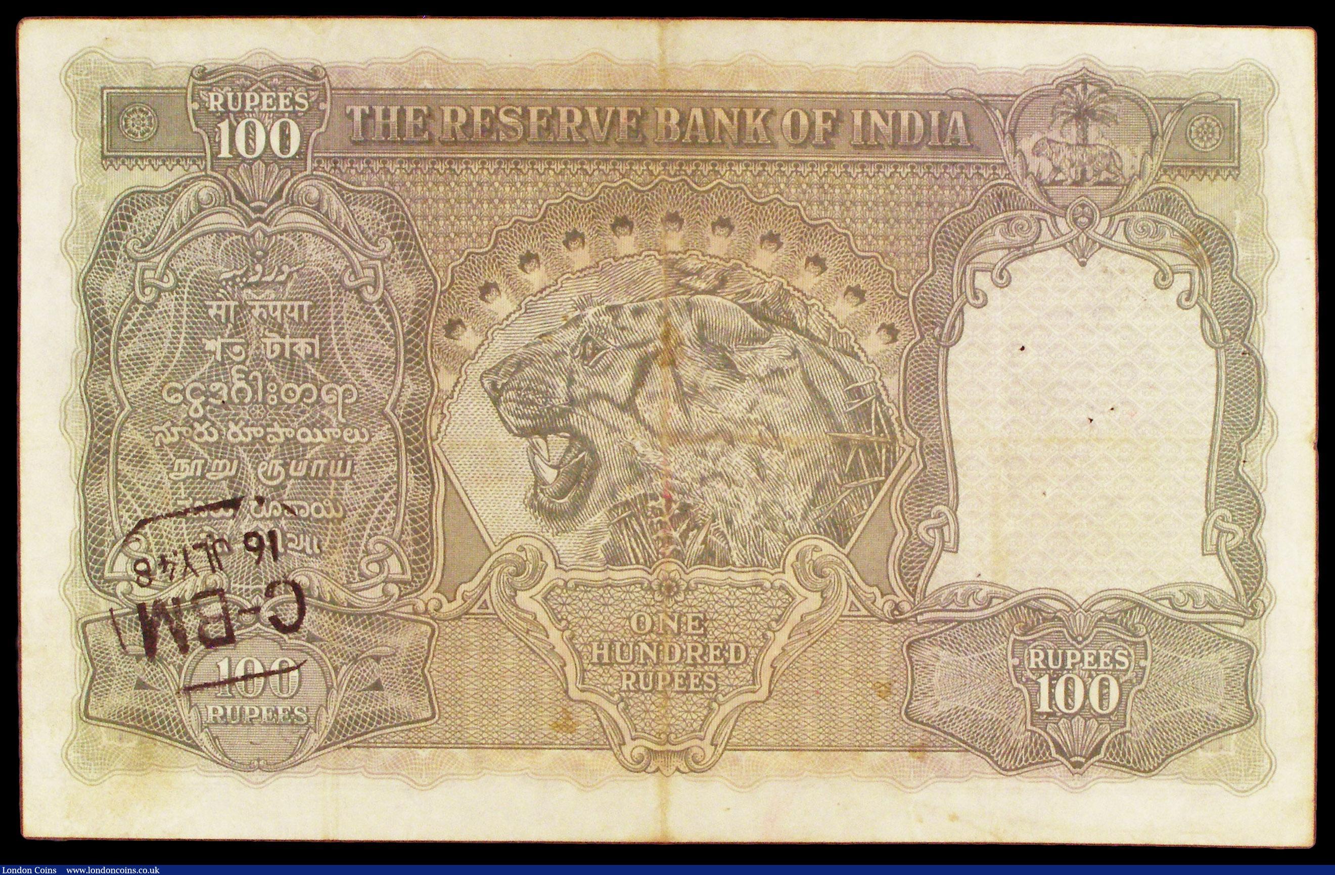 London Coins : A154 : Lot 184 : India 100 rupees KGVI issued 1943 series A/77 967188, Calcutta branch, signed Deshmukh, Pick20e, pin...
