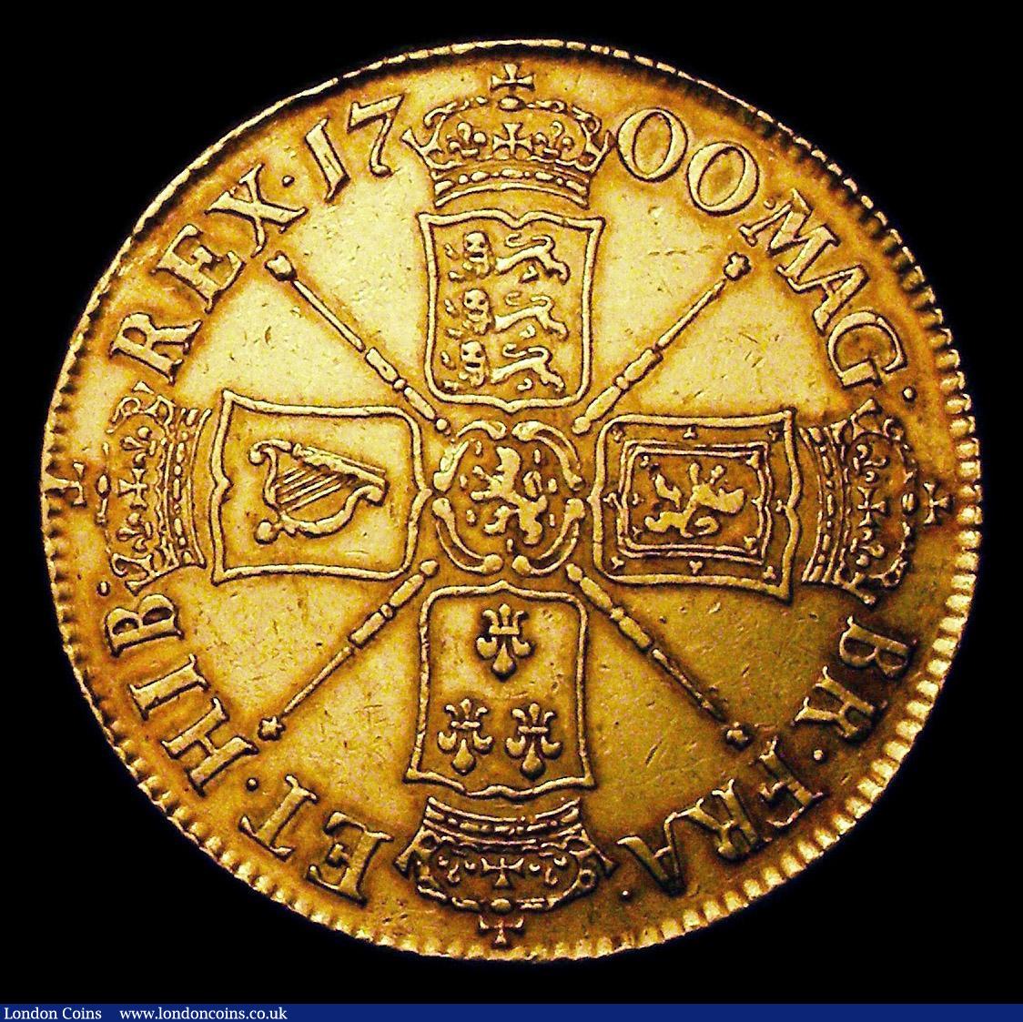London Coins : A154 : Lot 1944 : Five Guineas 1700 First Laureate Bust DVODECIMO edge S3454 nVF/VF (centre of portrait weak as often)...