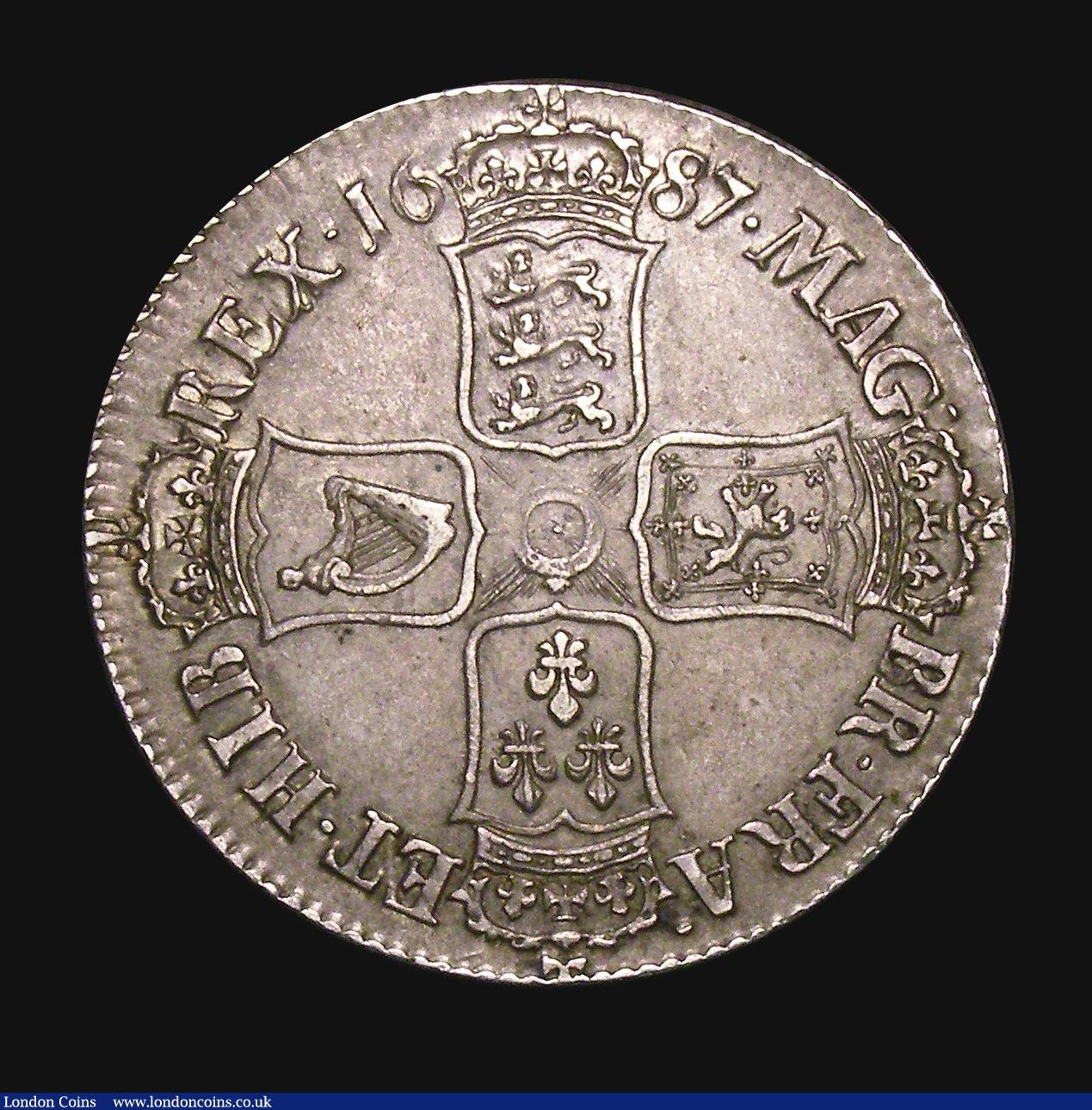 London Coins : A155 : Lot 560 : Crown 1687 TERTIO ESC 78 GVF and attractively toned, boldly struck the obverse and free from adjustm...