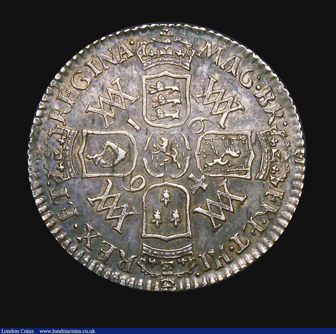 London Coins : A155 : Lot 665 : Sixpence 1694 ESC 1531 NEF toned the obverse with a small striking flaw by GVLI, Very rare in this h...